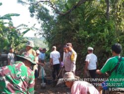 Bhabinkamtibmas Polres Wajo Gotong Royong Bersama Warga Perbaikan Jalan Perkebunan